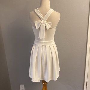 White bow back dress